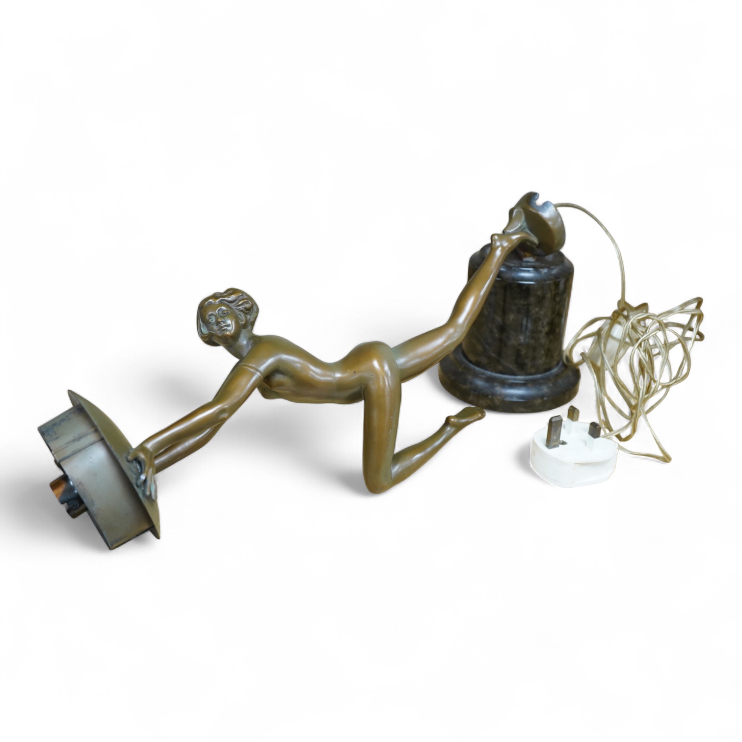 An Art Deco patinated spelter figural lamp, serpentine marble plinth (detached)